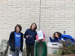 rain barrel with boys